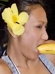 Thai Rowena sucking a banana